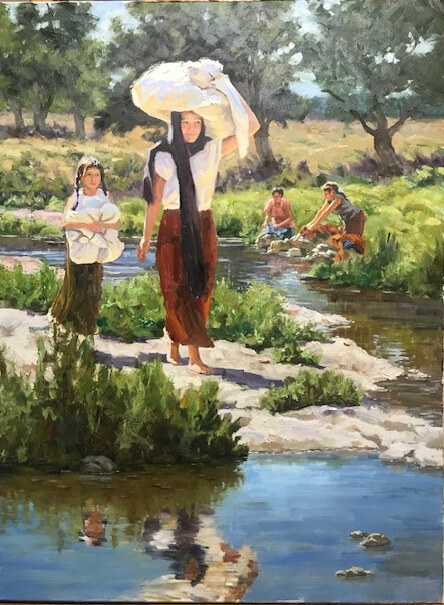 Women carrying and washing laundry beside a tree-lined creek in Laundry Day by Edgar J. Sotelo