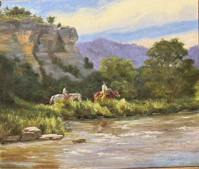Two riders traveling beside reflective river water beneath rocky cliffs in Reflections on the Brazos