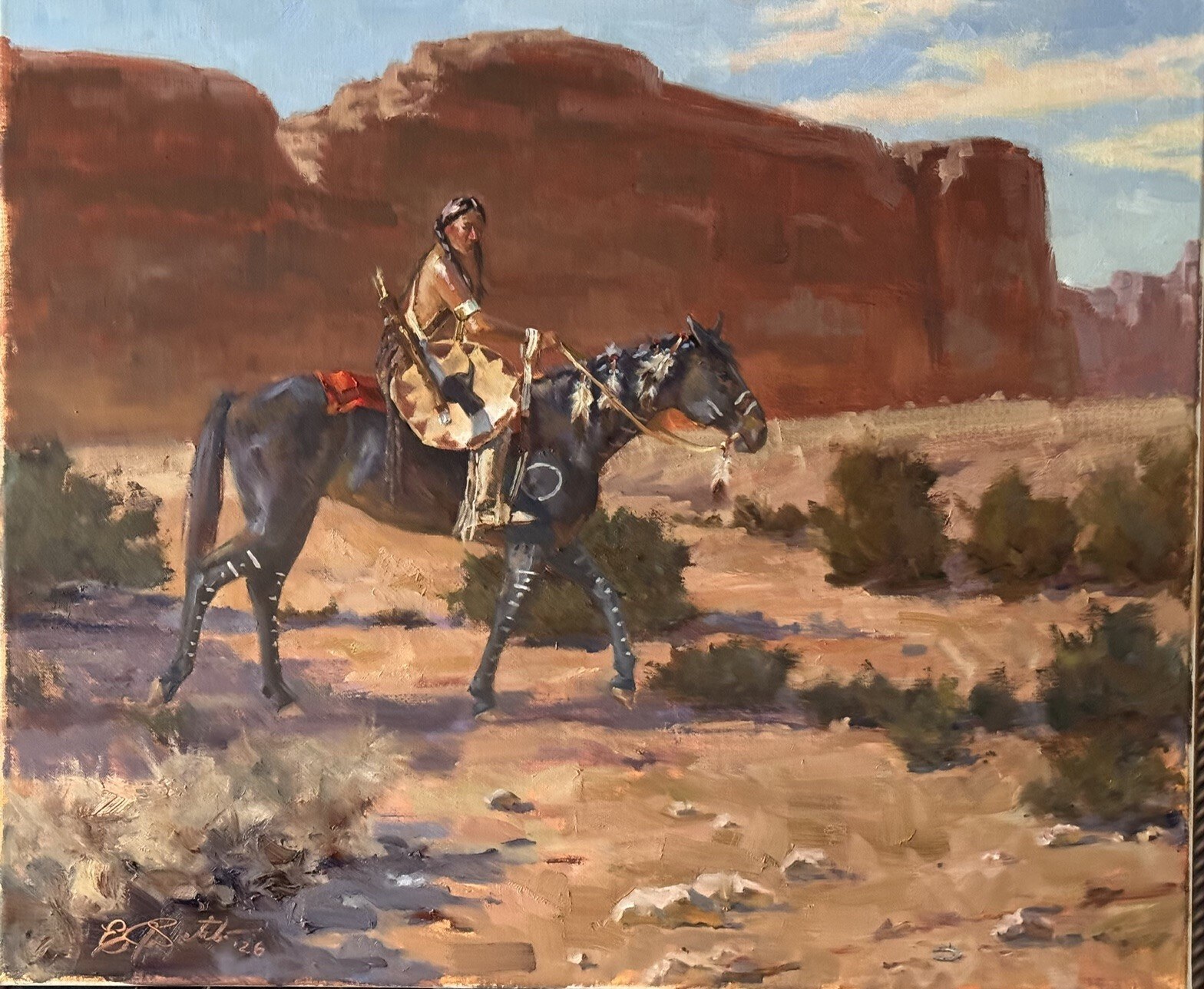 Mounted Indigenous traveler crossing a desert landscape beneath red sandstone cliffs in Sign of the White Man by Edgar J. Sotelo