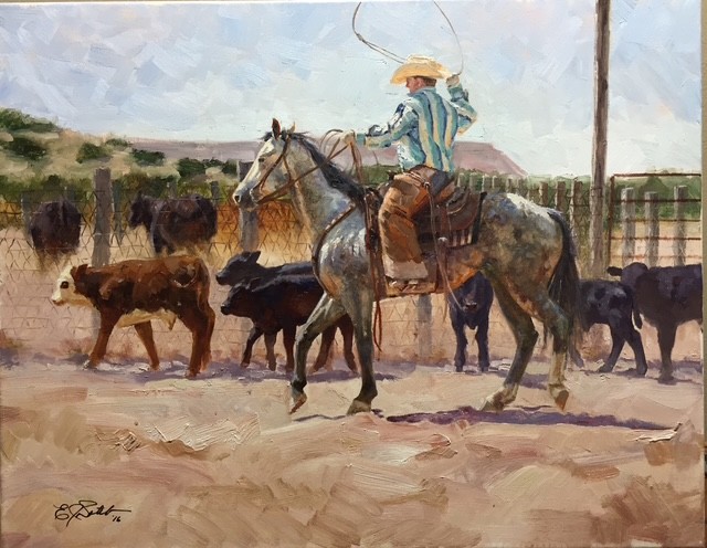 Cowboy on a gray horse swinging a rope above cattle in a sunlit corral
